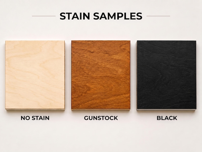 Three square birch plywood stain samples showing the available finishes of natural wood with no stain, warm brown gunstock, and solid black.