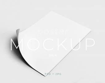May include: A white poster mockup with the text "poster MOCKUP DIN A PSD + JPG" on a white background.