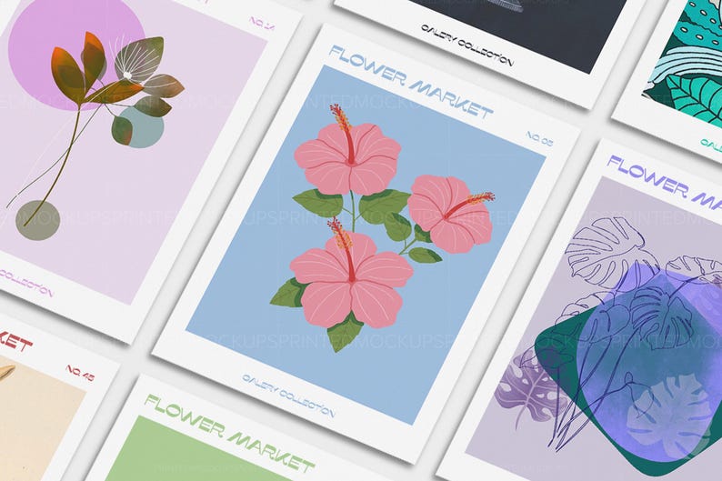 May include: A collection of art prints featuring floral and botanical illustrations. One print showcases pink hibiscus flowers on a light blue background. Other prints display abstract plant designs in various colors, including green, purple, and orange.