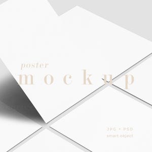 May include: A minimalist poster mockup featuring several white paper sheets arranged at angles, casting shadows. The words "poster mockup" are displayed in a soft, neutral font. The image also includes text indicating file types: JPG and PSD, and the words "smart object."