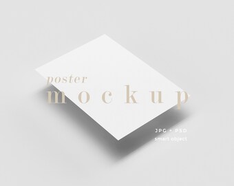 May include: A white poster mockup with the text "poster mockup" in a light brown font. The text "JPG + PSD smart object" is also visible in the bottom right corner.