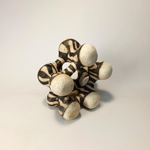 Interior Designer. Modern and Minimal Design. Interior sculpture. Abstract sculptures. White terracotta decor. Abstract sculpture.