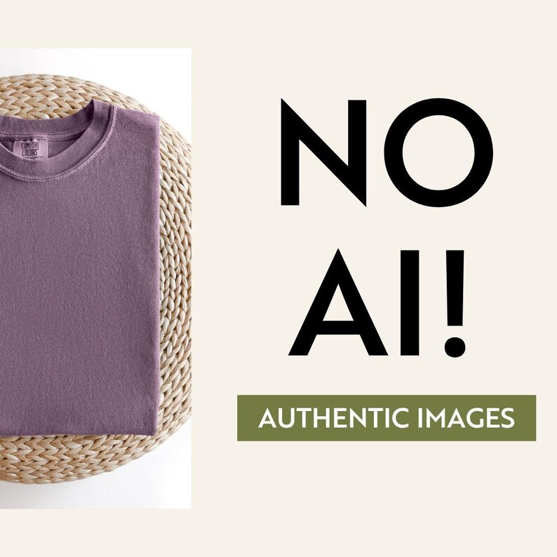 May include: A mauve-colored crew neck t-shirt rests on a woven surface. The image features the text "NO AI!" in bold black letters, with "AUTHENTIC IMAGES" in a green rectangle below, emphasizing the product's authenticity.