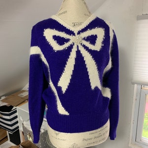 Vintage Purple V Neck Sweater With Embellished Bow by Jaclyn Smith