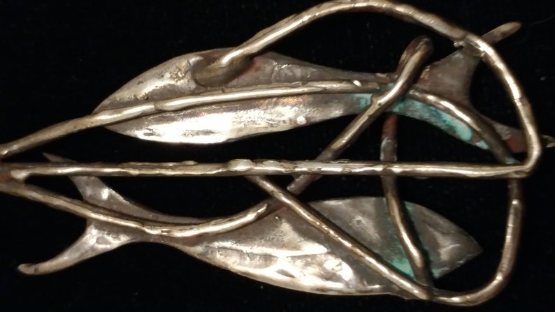 Unsigned Mid-century Sterling Fishes Pendant