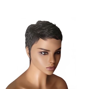 May include: A mannequin head with short, dark, textured hair styled in a pixie cut. The mannequin has a smooth, tan complexion, defined eyebrows, and subtle makeup. The background is plain white.