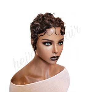 May include: A short, curly, brown wig with a side part. The wig is styled in a pixie cut with a slight wave.