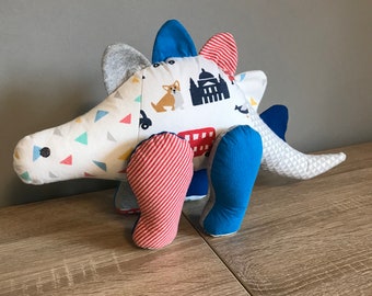 Memory keepsake dinosaur made using old baby clothing