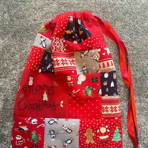 Baby clothes keepsake Christmas sack