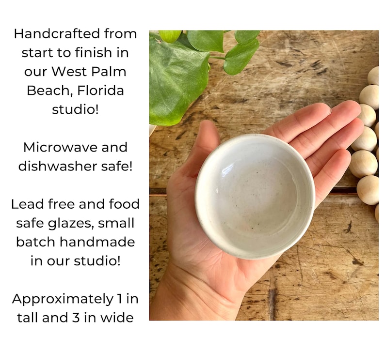 May include: A small, white ceramic bowl, approximately 1 inch tall and 3 inches wide. The bowl is handmade and food safe.