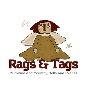 May include: Illustration of a primitive angel doll with a brown dress and wings. The doll has red hair and a stitched face. The text "Rags & Tags" is in a dark red font, with the text "Primitive and Country Dolls and Wares" below.