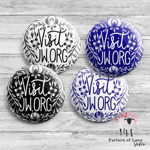 May include: Four round buttons with a white background and a blue or black floral design. The text "Visit JW.ORG" is written in white on the blue buttons and in black on the black buttons.
