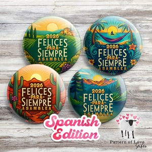 May include: Four round buttons with colorful landscape designs. Each button features the text "2026 FELICES -PARA- SIEMPRE ASAMBLEA". The designs include a vineyard, tropical scene, desert landscape, and a mountain scene. A "Spanish Edition" sticker is also present.