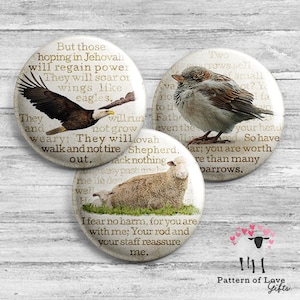 May include: Three round buttons with inspirational quotes and images of an eagle, a sparrow, and a sheep. The eagle button says "But those hoping in Jehovah will regain power. They will soar on wings like eagles. They and not grow weary: They will walk and not tire Shepherd, out."