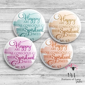 May include: Four round buttons with inspirational quotes. Each button features the words "Happy are those conscious of their spiritual need" with the reference "MT. 5:3" or "5:3". The buttons have a watercolor effect in shades of blue, peach, pink, and orange.