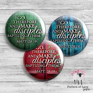 May include: Three round buttons with a wood grain background and the text "GO, THEREFORE, AND MAKE DISCIPLES. BAPTIZING THEM." - MATT. 28:19