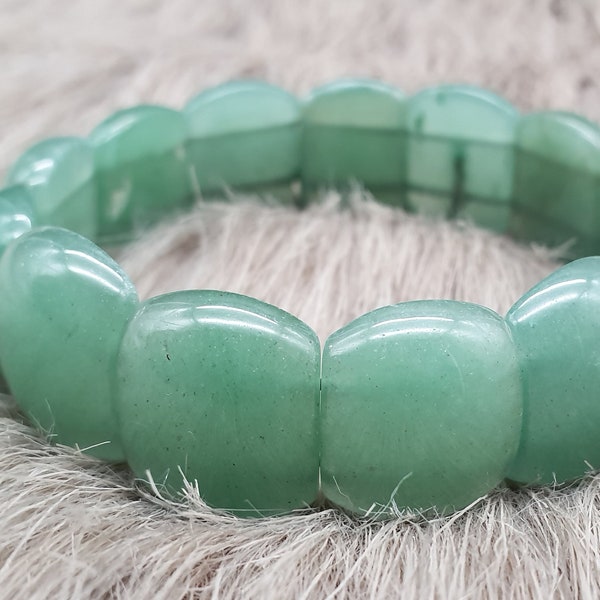 Bangle made of green gemstones
