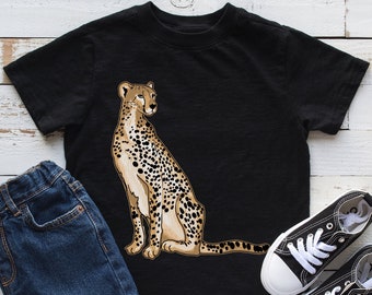 May include: Black t-shirt with a cheetah print design. The cheetah is facing to the right and has a spotted pattern.
