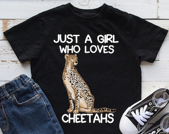 May include: Black t-shirt with a cheetah graphic and the text "Just a girl who loves cheetahs".