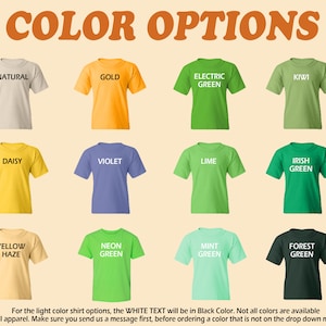 May include: A chart showing 12 different t-shirt colors with the color name printed on each shirt. The colors include natural, gold, electric green, kiwi, daisy, violet, lime, Irish green, yellow haze, neon green, mint green, and forest green. The text "COLOR OPTIONS" is at the top of the chart.