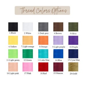 May include: A color chart titled Thread Colors Options displaying twenty numbered thread spools in various shades including black, white, grey, brown, olive, yellow, orange, purple, green, blue, cyan, pink, red, maroon, and gold with labels.