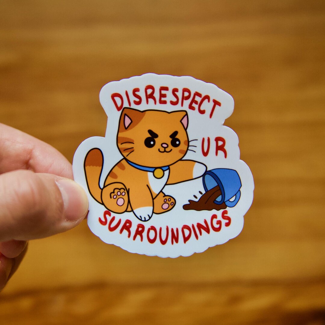 Orange Cat Knocking Over Coffee 