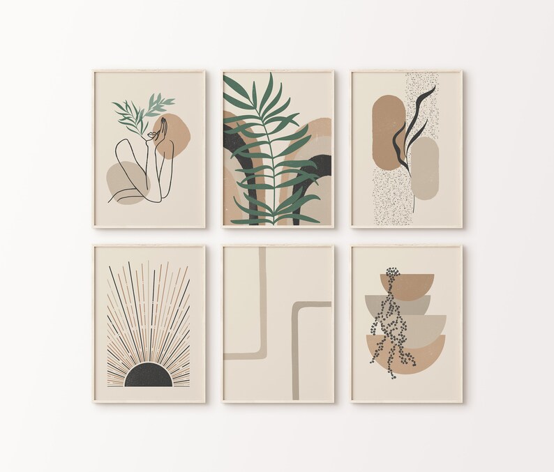 May include: Set of six minimalist art prints featuring abstract shapes, line drawings, and botanical elements in shades of brown, beige, and green. The prints are framed in a light wood frame.