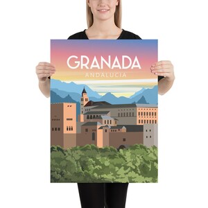 May include: A poster featuring a stylized illustration of Granada, Andalusia, with the city's name in large white letters. The artwork depicts buildings, mountains, and a colorful sky, evoking a travel theme.