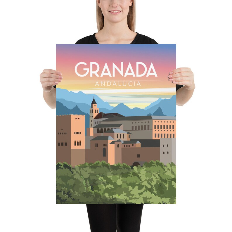 May include: A poster featuring a stylized illustration of Granada, Andalusia, with the city's name in large white letters. The artwork depicts buildings, mountains, and a colorful sky, evoking a travel theme.