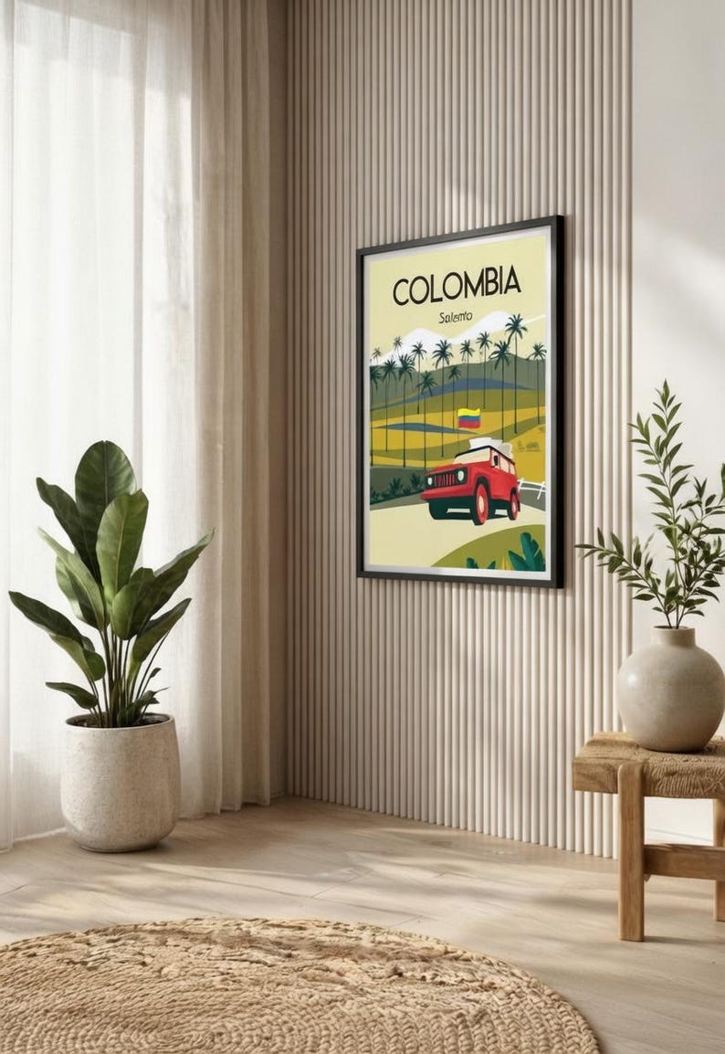 May include: A framed poster with the word "COLOMBIA" and "Salento" printed on it. The poster features a red jeep driving on a road, palm trees, and the Colombian flag. The poster is hanging on a beige wall.