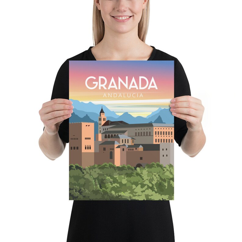May include: A poster featuring a stylized illustration of Granada, Spain, with the city's name and "Andalucia" in white text against a sunset sky. The artwork depicts buildings, a tower, and mountains.