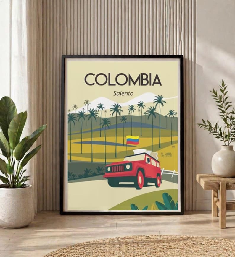 May include: A framed travel poster featuring the word "COLOMBIA" above "Salento". The poster depicts a red jeep driving on a road with palm trees and rolling hills. A Colombian flag waves in the background.