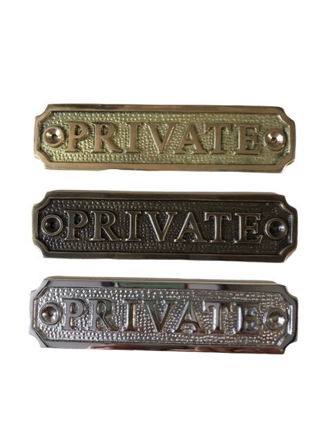 Private door sign available in three finishes - nickel, antique bronze or brass. Matching screws are included. 13.2 cm X 3.4 cm.