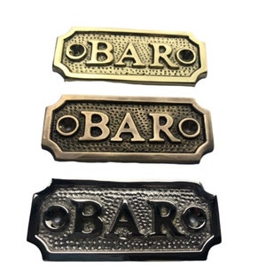 New BAR door sign solid brass available in three finishes - nickel, antique bronze or brass. Matching screws are included. 8 cm X 3.3cm.