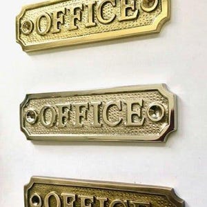 Office door sign made from solid brass with a choice of finish. Brass, nickel or antique bronze. Matching screws provided Size 11.5 x 3.3CM