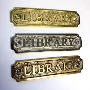 Library door sign made from solid brass with a choice of finish. Brass, nickel or antique bronze. The plaque with screws.13.6 x 3.2 x 0.4 CM