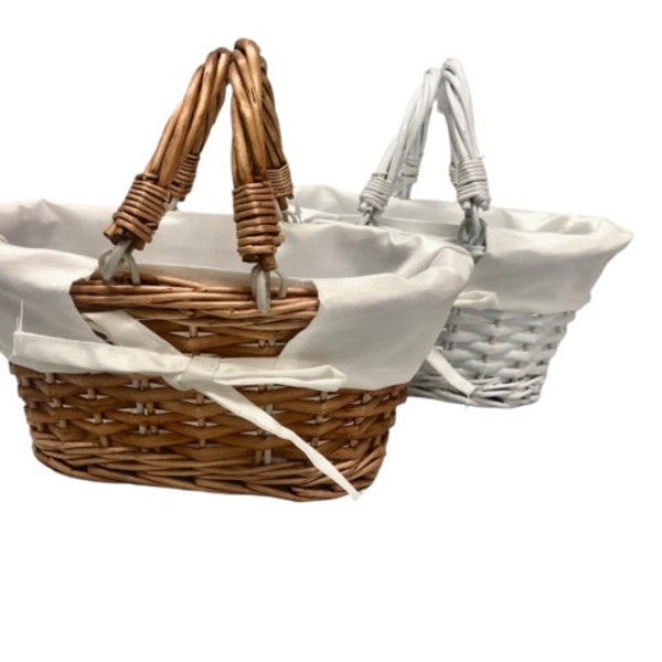 Small basket for Bridesmaid or Flower girl lined with a washable lining,has a bow decoration. Foldable handles, choose either buff or white.