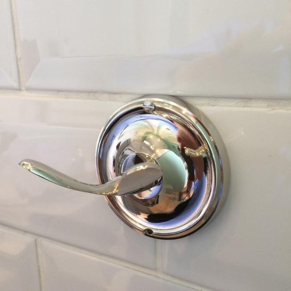 Bath robe hook, made from solid brass with a plain nickel finish. Sent with matching screws.