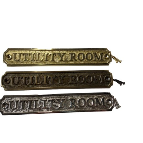 Utility room door sign available in three finishes - silver nickel, antique bronze or brass. Matching screws included. 20.5 cm X 3.5cm.