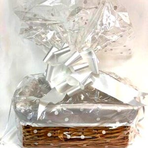 rectangular buff hamper basket with cellophane and bow