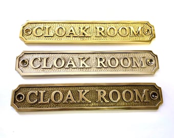 Cloak room solid brass door sign available in a choice if three finishes antique bronze, nickel or polished brass. Matching screws provided.