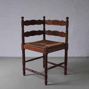 Carved Oak Corner Chair with Rush Seat | 1950s