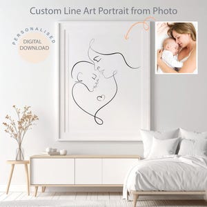 May include: A framed black line art portrait of a mother and child, with a heart-shaped design. The artwork is displayed above a white cabinet in a bedroom setting. The text "Custom Line Art Portrait from Photo" is at the top.