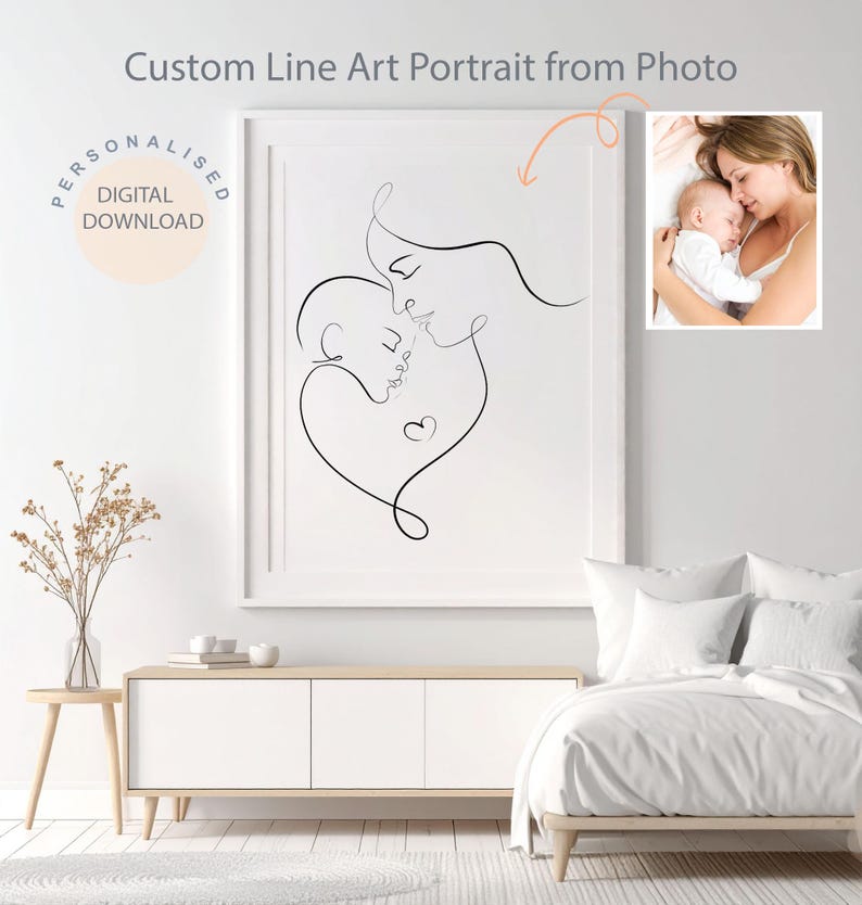 May include: A framed black line art portrait of a mother and child, with a heart-shaped design. The artwork is displayed above a white cabinet in a bedroom setting. The text "Custom Line Art Portrait from Photo" is at the top.
