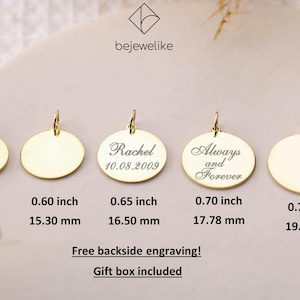 May include: Five gold-colored round pendants of different sizes with a loop at the top. The pendants are blank except for the middle one, which has the text "Rachel 10.08.2009" engraved on it. The pendant to the right of the middle one has the text "Always and Forever" engraved on it. The pendants are arranged from left to right in order of increasing size. The sizes of the pendants are listed below each pendant in inches and millimeters.