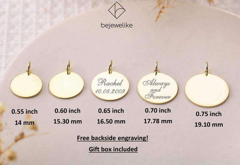 May include: Five gold-colored round pendants of different sizes with a loop at the top. The pendants are blank except for the middle one, which has the text "Rachel 10.08.2009" engraved on it. The pendant to the right of the middle one has the text "Always and Forever" engraved on it. The pendants are arranged from left to right in order of increasing size. The sizes of the pendants are listed below each pendant in inches and millimeters.