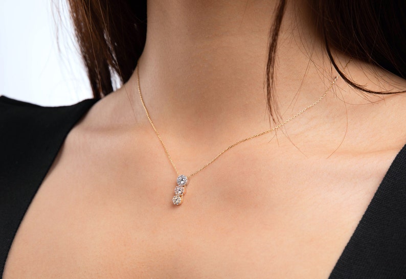TRIOSTONE NECKLACE GOLD main image 0