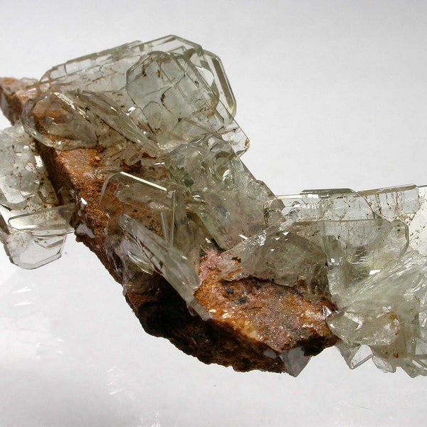 BARYTE - Bright clear Baryte crystals resting on matrix from Peru.