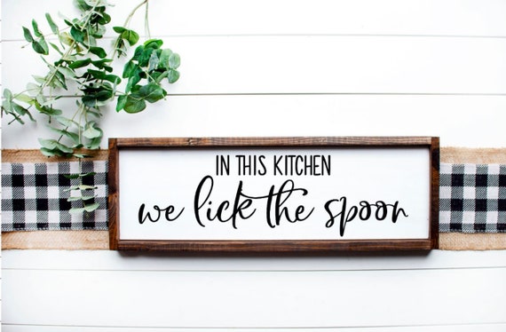 In This Kitchen We Lick The Spoon Wood Sign