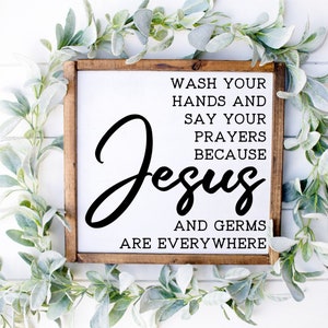 Letrero de madera "Jesús y los gérmenes están en todas partes"